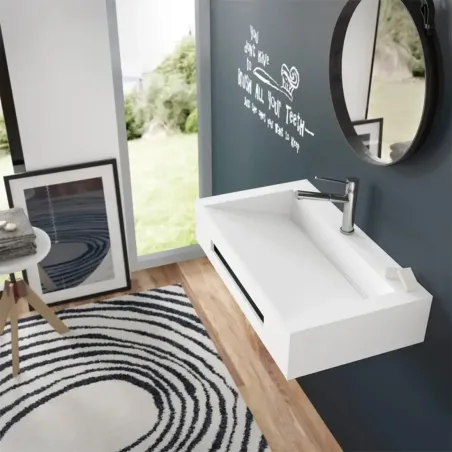 ENCIMERA SOLID SURFACE A MEDIDA ARLES CON FALDON BAALNEO