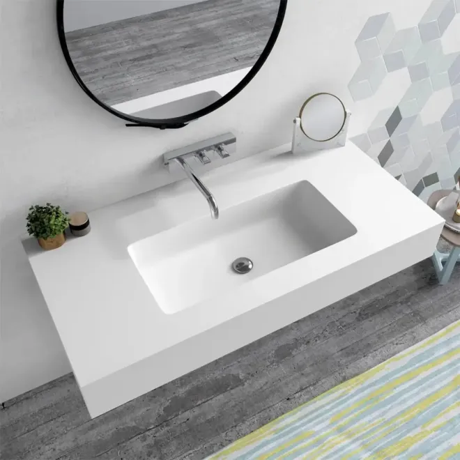 ENCIMERA SOLID SURFACE A MEDIDA BELITRE CON FALDON BAALNEO
