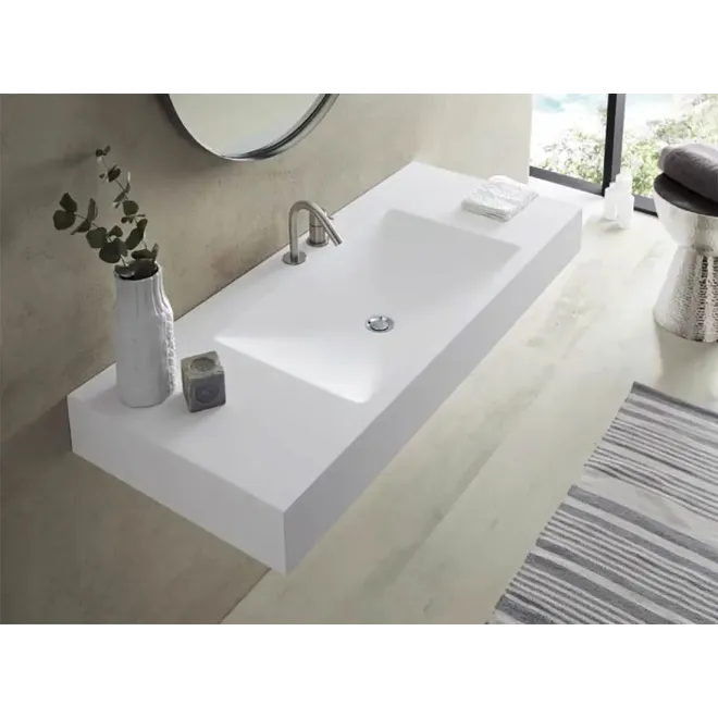 ENCIMERA SOLID SURFACE A MEDIDA BRINDISI CON FALDON BAALNEO