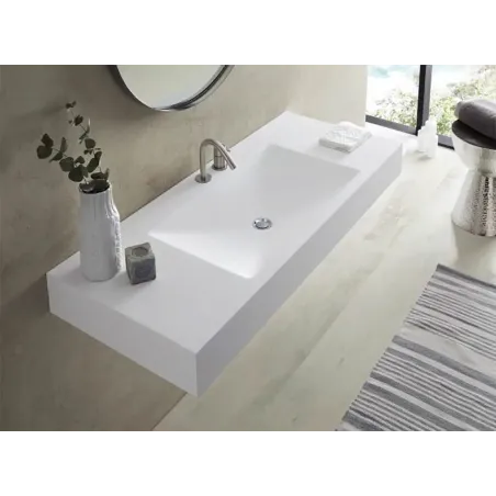 ENCIMERA SOLID SURFACE A MEDIDA BRINDISI CON FALDON BAALNEO