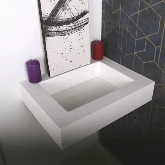 ENCIMERA SOLID SURFACE A MEDIDA GRECO CON FALDON BAALNEO