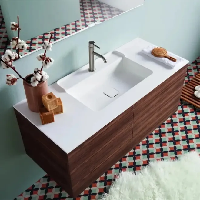 ENCIMERA SOLID SURFACE A MEDIDA SORRENTO CON FALDON BAALNEO